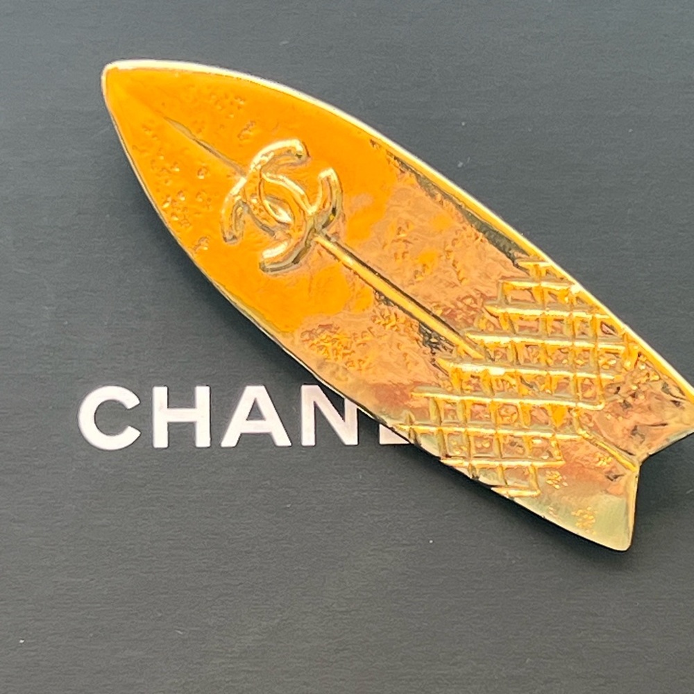 Amazing Chanel gold surfboard brooch.
